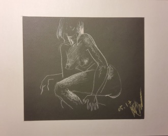 Обнаженная в позе полулежа