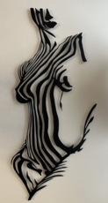 The figure of a girl made of metal